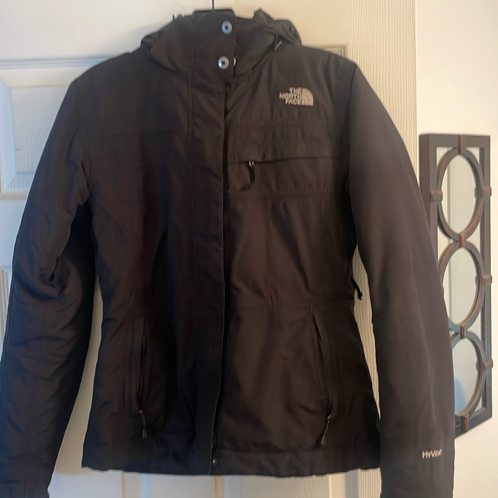 The North Face ski jacket. S/P. Black. Great used condition.